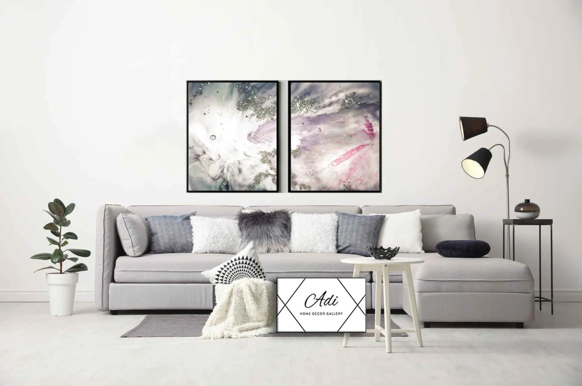 זוג תמונות אבסטרקט בצבע ורוד וכסוף מסגרת שחורה