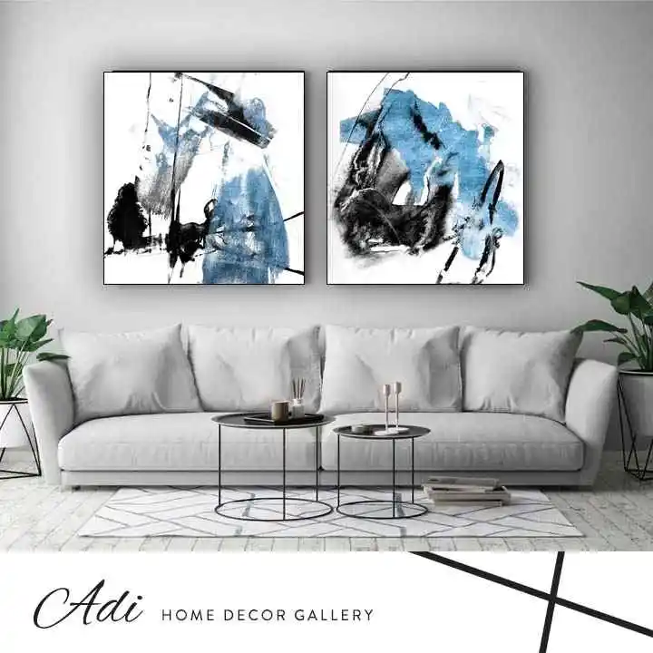 זוג תמונות קנבס אבסטרקט גווני שחור ותכלת