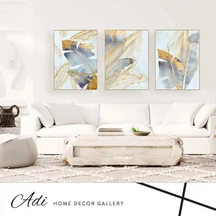 שלישיית תמונות קנבס נוצות ועלים בגווני טורכיז וזהב